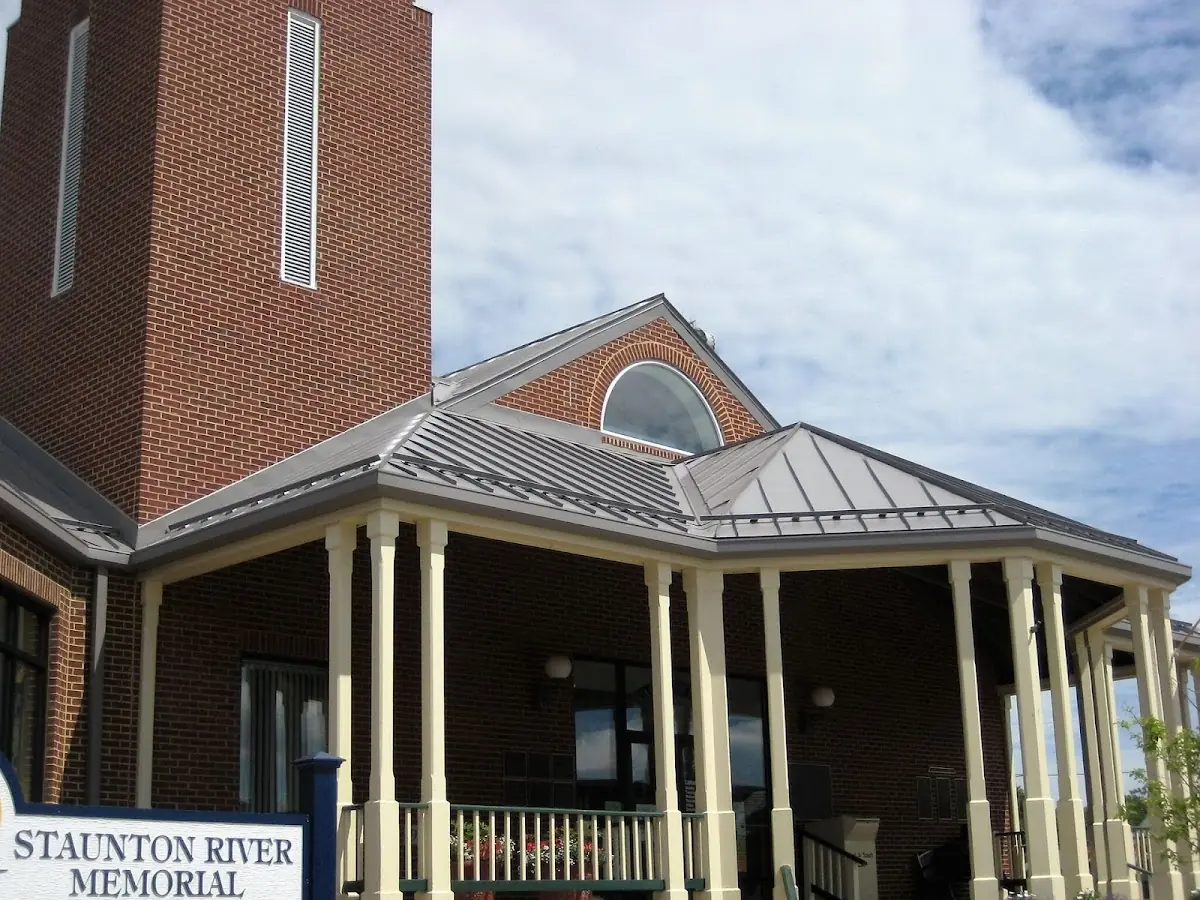 Skilled roofing craftsmen working on a residential roof in Elizabethton